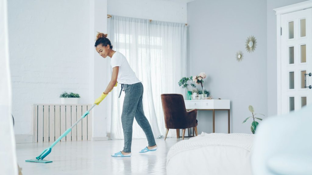 Bright modern living room being cleaned